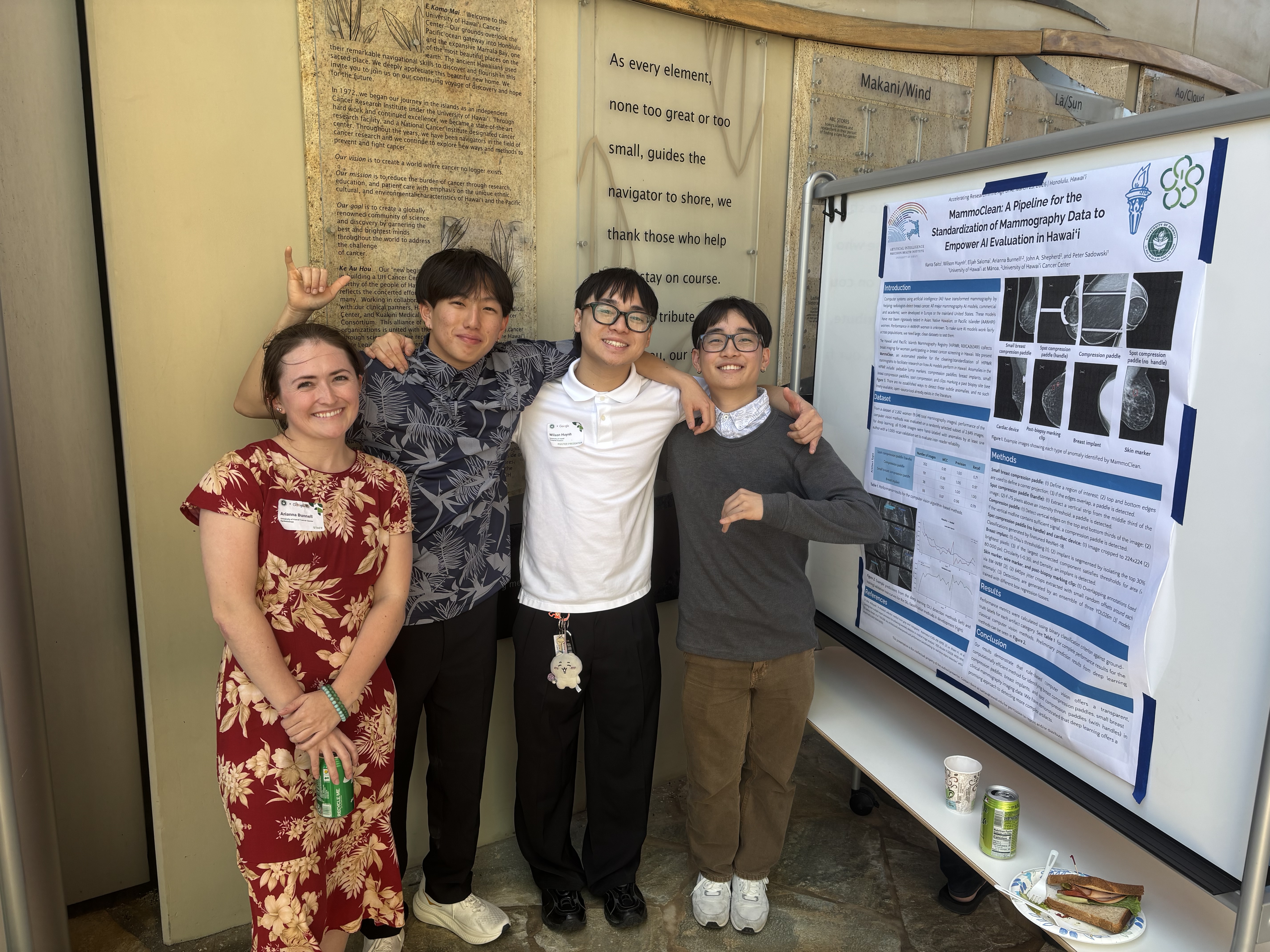 MammoClean team beside their research poster at the Google AI workshop